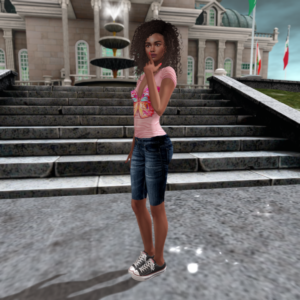 Stylecards Idol Ayodele Soyinka wear a Bakes on Mesh outfit from Gizza featuring a pink t-shirt with a butterfly emblem and a pair of denim capri pants. She is wearing canvas low tops from Semller.