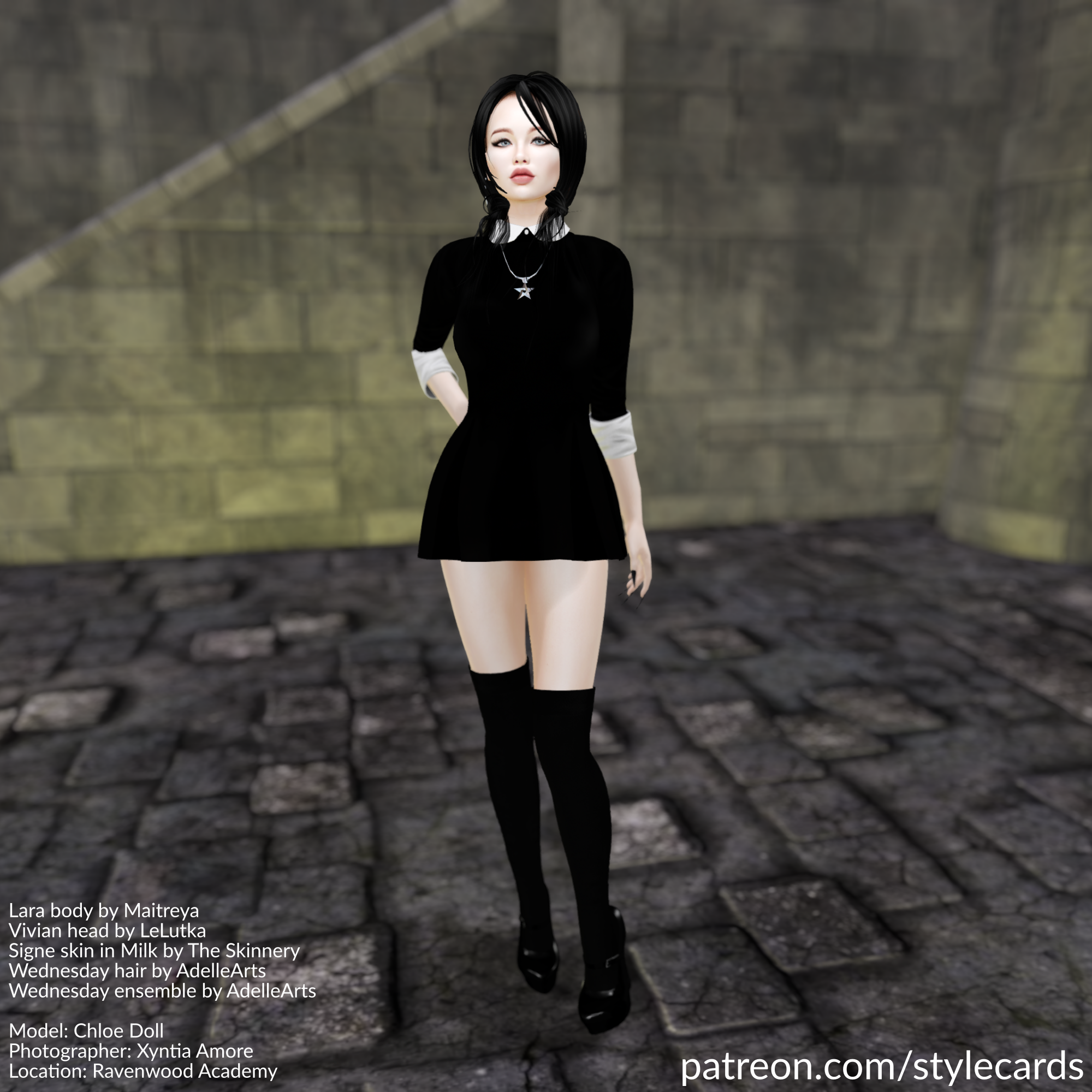 Chloe Doll stands in a black minidress accented by a white collar and white cuffs on the arms. For jewelry she has a necklace with a pentacle as a pendant. The ensemble is completed by black high-heels worn over black kneehighs.