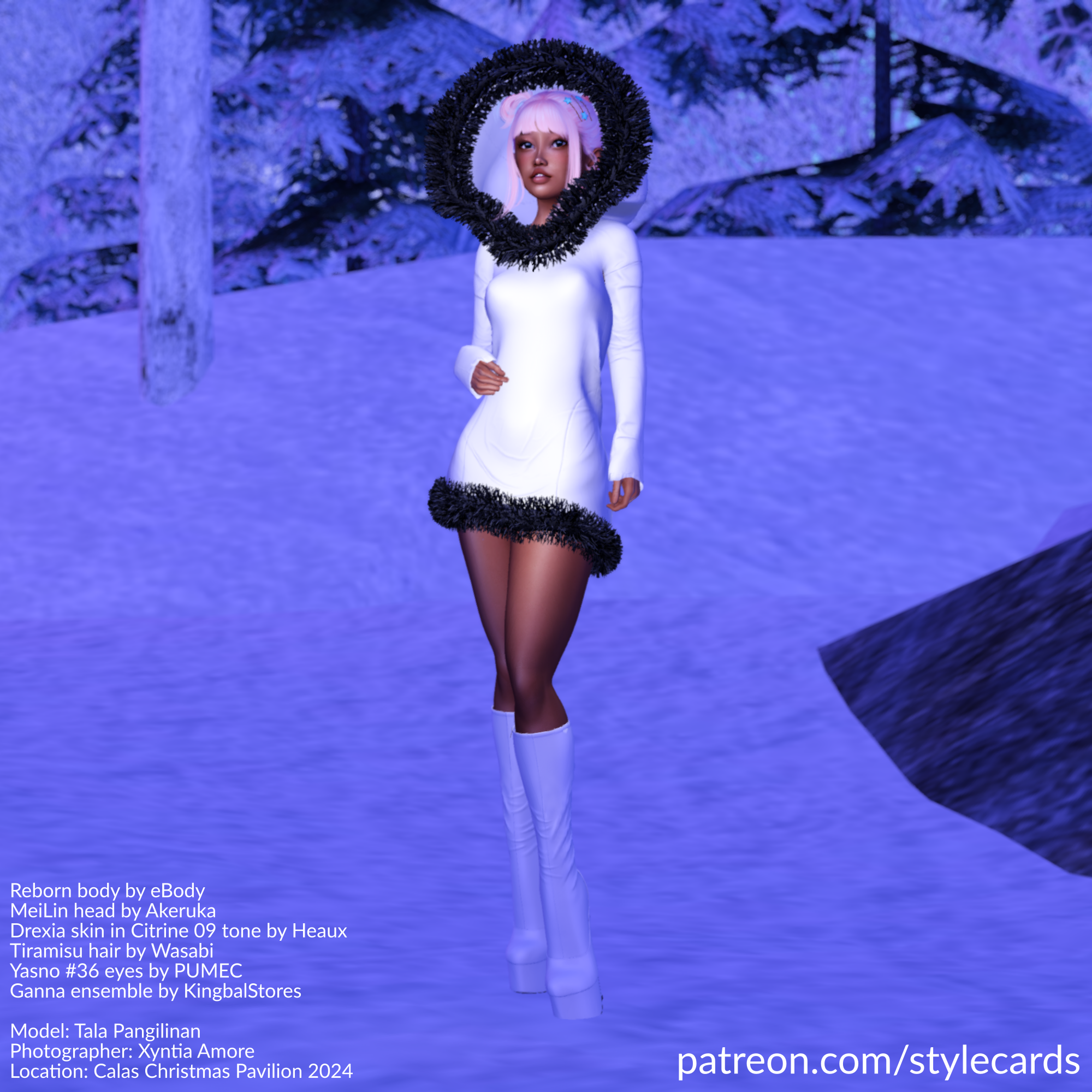 Tala Pangilinan stands in a forest at Calas Christmas Pavilion 2024 in Second Life. She is wearing a white hooded dress trimmed in black fur while a pair of white knee high boots keep her feet warm and dry