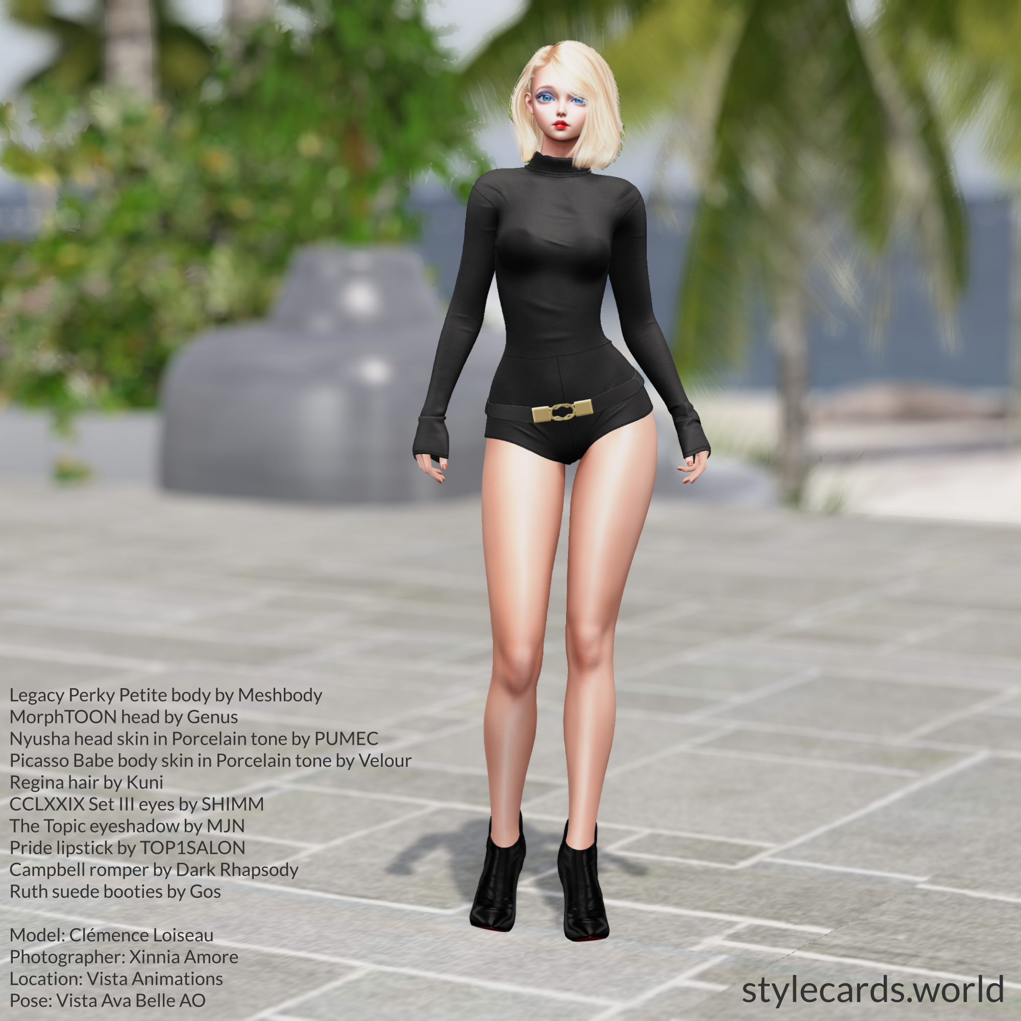 Clémence Loiseau is sporting short blonde hair while standing on a plaza near a beach. In the background are some palm trees. She is wearing a charcoal grey romper with a golden belt buckle, along with a pair of high heeled ankle boots.