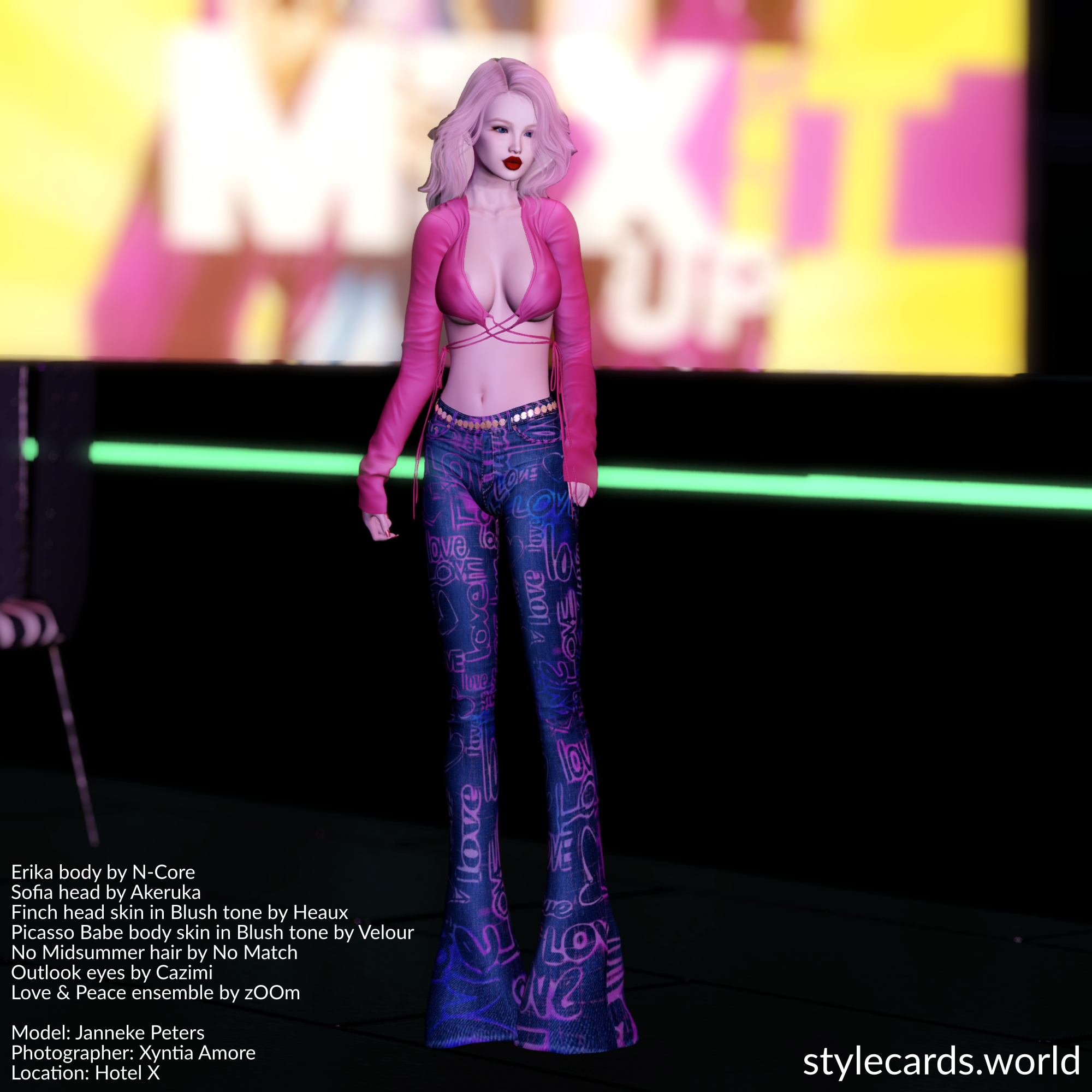 Janneke Peters is standing on the outdoor seating area for Voice Club X in Hotel X. The word "love" is written on her blue jeans several times and in different colors. Her top is revealing, but has long sleeves.