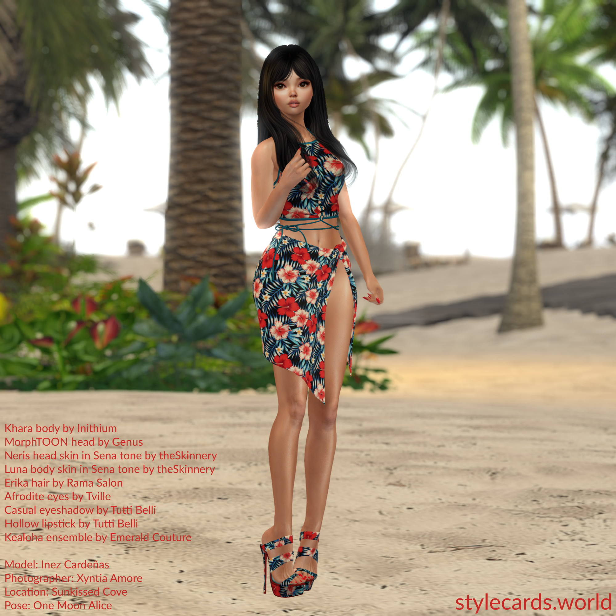 Model Inez Cardeñas is wearing a floral top with a matching wrap skirt and high heels in the Kealoha ensemble from Emerald Couture. She is standing on a beach with palm trees in the background. Her hair is long and black while her makeup is very subtle.