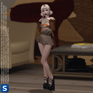 A full-length photo of model Cho Ji-Eun standing in a coffee shop. She is wearing a sweater which has the words 'Pumpkin Spice and Everything Nice' written upon it. She has a micromini pleated skirt that matches the sweater, and beneath the skirt we can see some black panties. She has black platform heels on her feet and blonde hair with pigtails on her head.