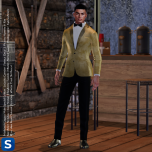 Model Ahmed Salam poses in a tuxedo that features a golden jacket, white shirt, black bow tie, black trousers, and black patent leather shoes. He is standing next to a bar in a log cabin.