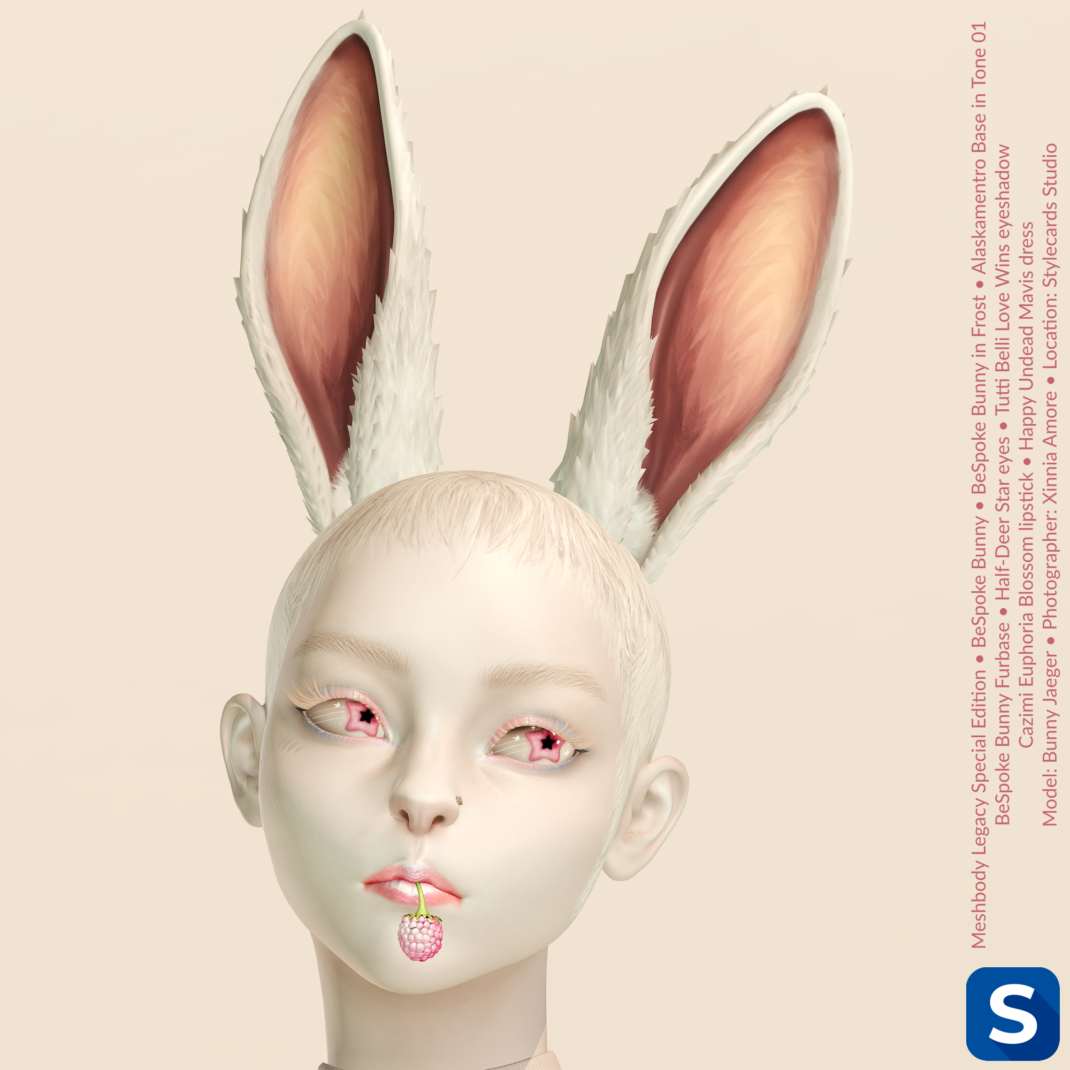 A headshot of a feminine head with a set of bunny ears in addition to human ears. hers skin is pale, as is her hair, but her eyelashes appear pale and barely hide the trans pride themed eyeshadow. Her lips are pale and pink, and hold a sprig with a pale pink raspberry at the end. Her eyes have pink irises in the shape of a five-pointed star.