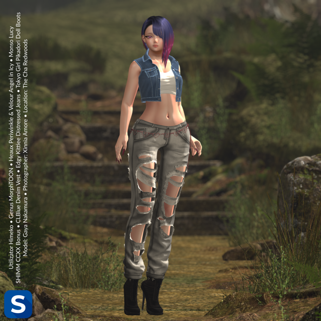 Threadsday, September 24, 2026 A denim-clad model stands on a dirt trail in a forest. She's wearing black high heel ankle boots, grey denim jeans with many fashionable holes, a pink chain belt with heart-shaped links, a white crop t-shirt and a blue denim vest. Her asymmetric hair style is ombre blue and purple.