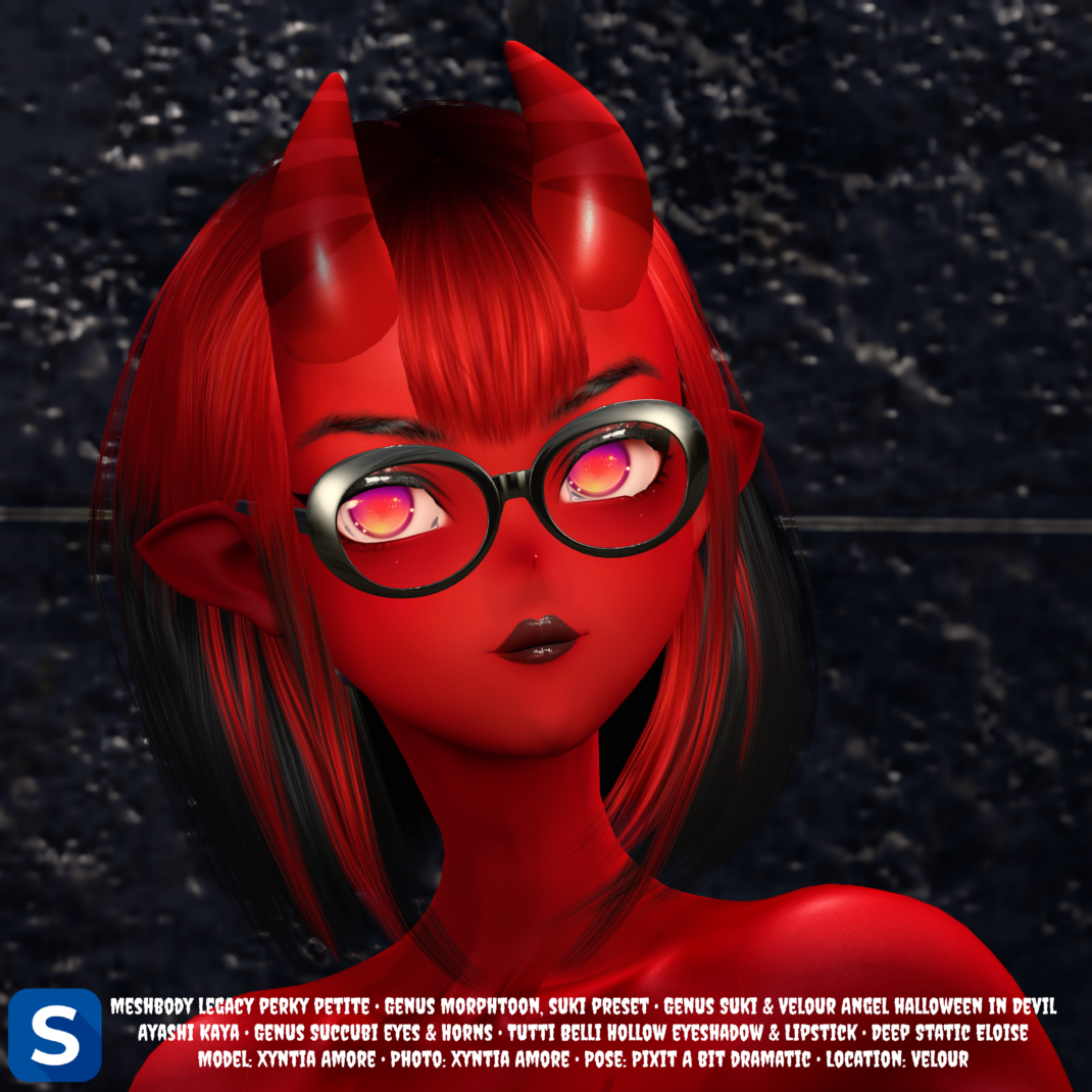 Makeup Monday, October 12, 2026 A headshot of a succubus outfit for Halloween. This means bright red skin, devil's horns, and pointy ears, to which we've added short red-and-black hair, black eyebrows, glowing eyes and eyeglasses with thick black frames.
